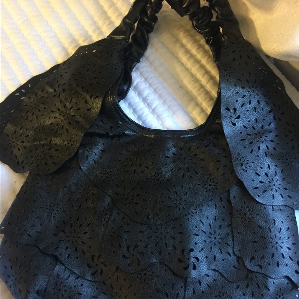 Mellow World  floral patterns cut out of leather